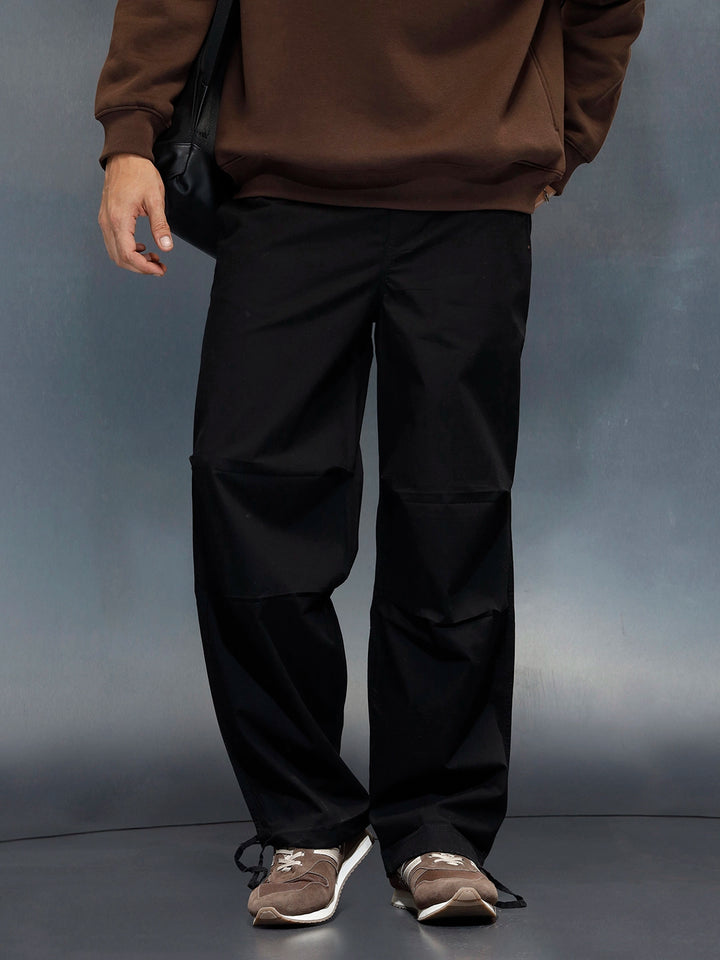 Men's loose fit trouser with draw string in the hem  | Black