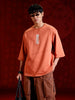 Men’s oversized 3/4 sleeve T-shirt with chest print & tonal stich detail | Rust