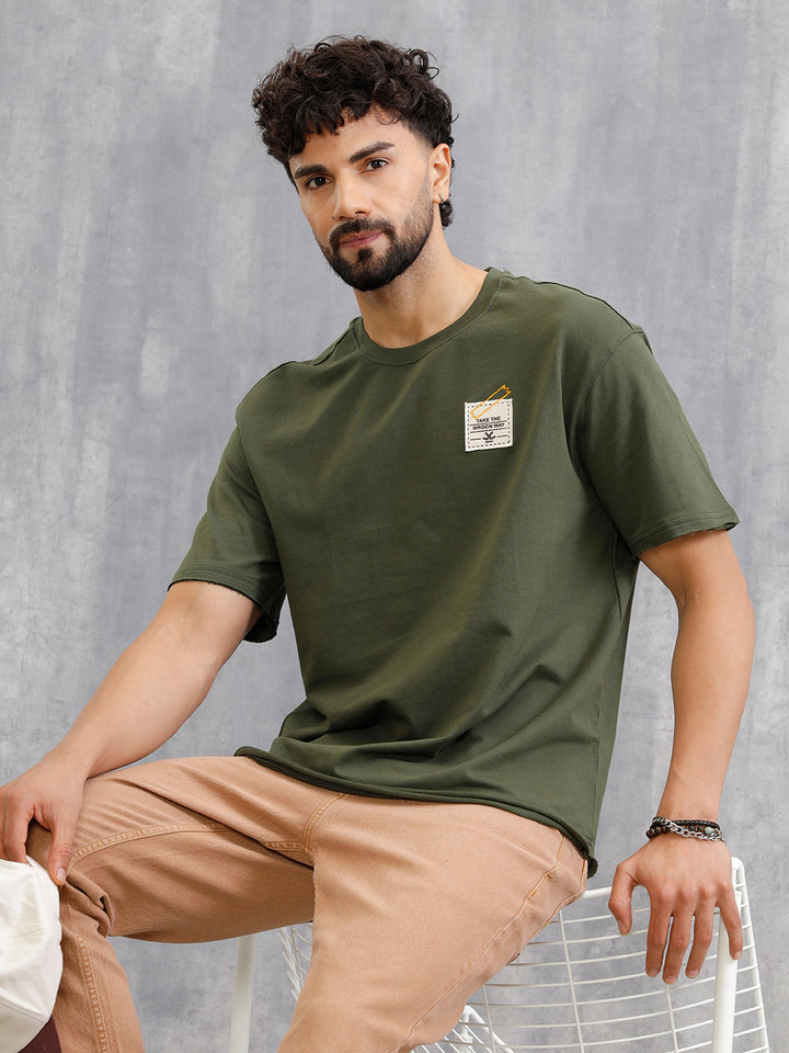 Solid Oversized T-Shirt With Printed Canvas Patch And Raw Edge Detail | Olive