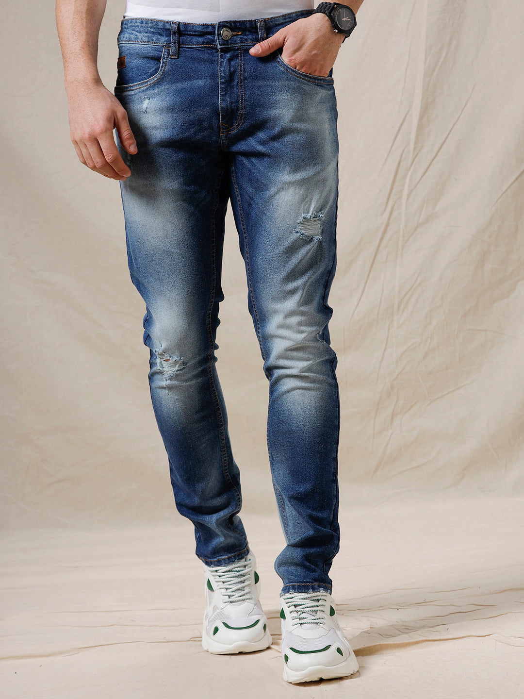 Ripped And Faded Casual Blue Jeans