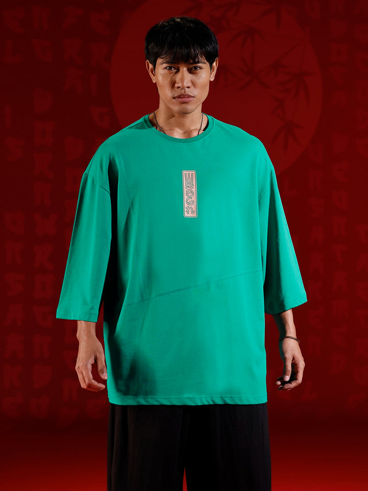 Oversize 3/4 sleeve tshirt with vertical label print detail | Green