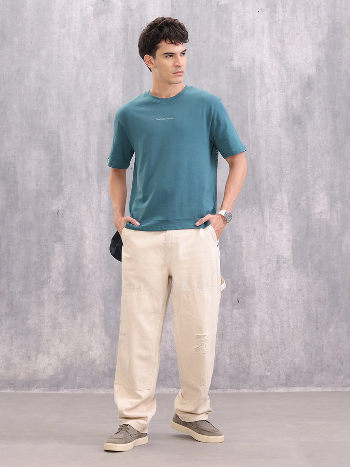 Typo Print Comfort Fit T-Shirt With High-Low Hem | Teal