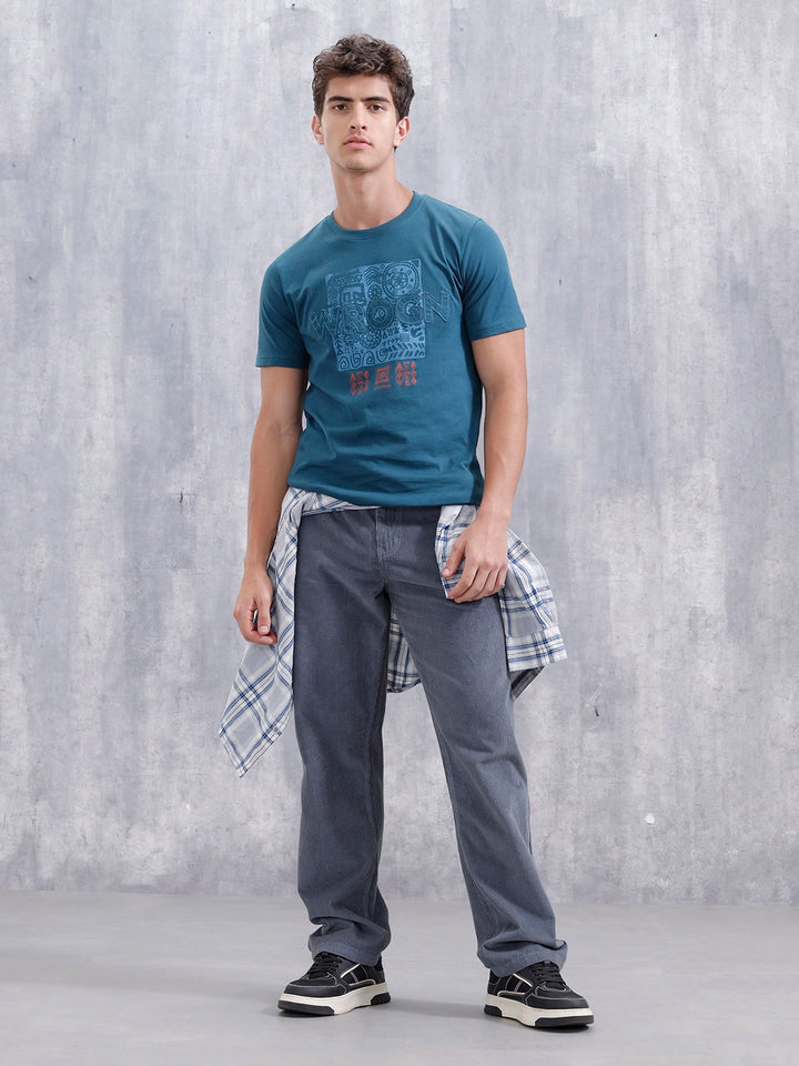 Ancient Markings Inspired Slim Fit Patchwork Brand Carrier T-Shirt | Teal