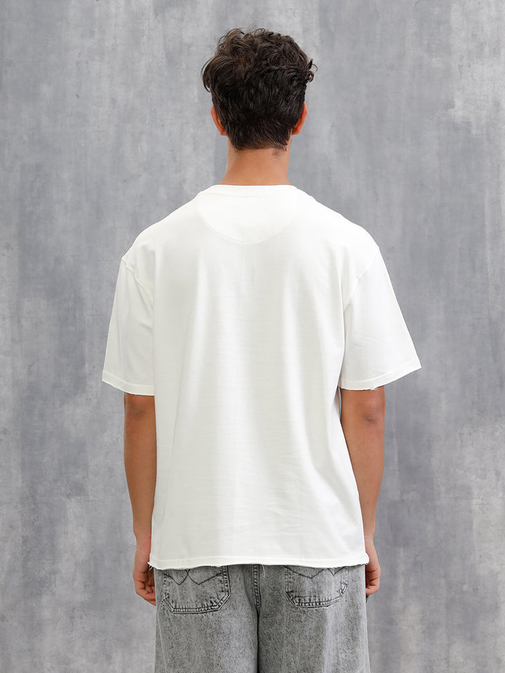 Solid Oversized T-Shirt With Printed Canvas Patch And Raw Edge Detail  | Off White