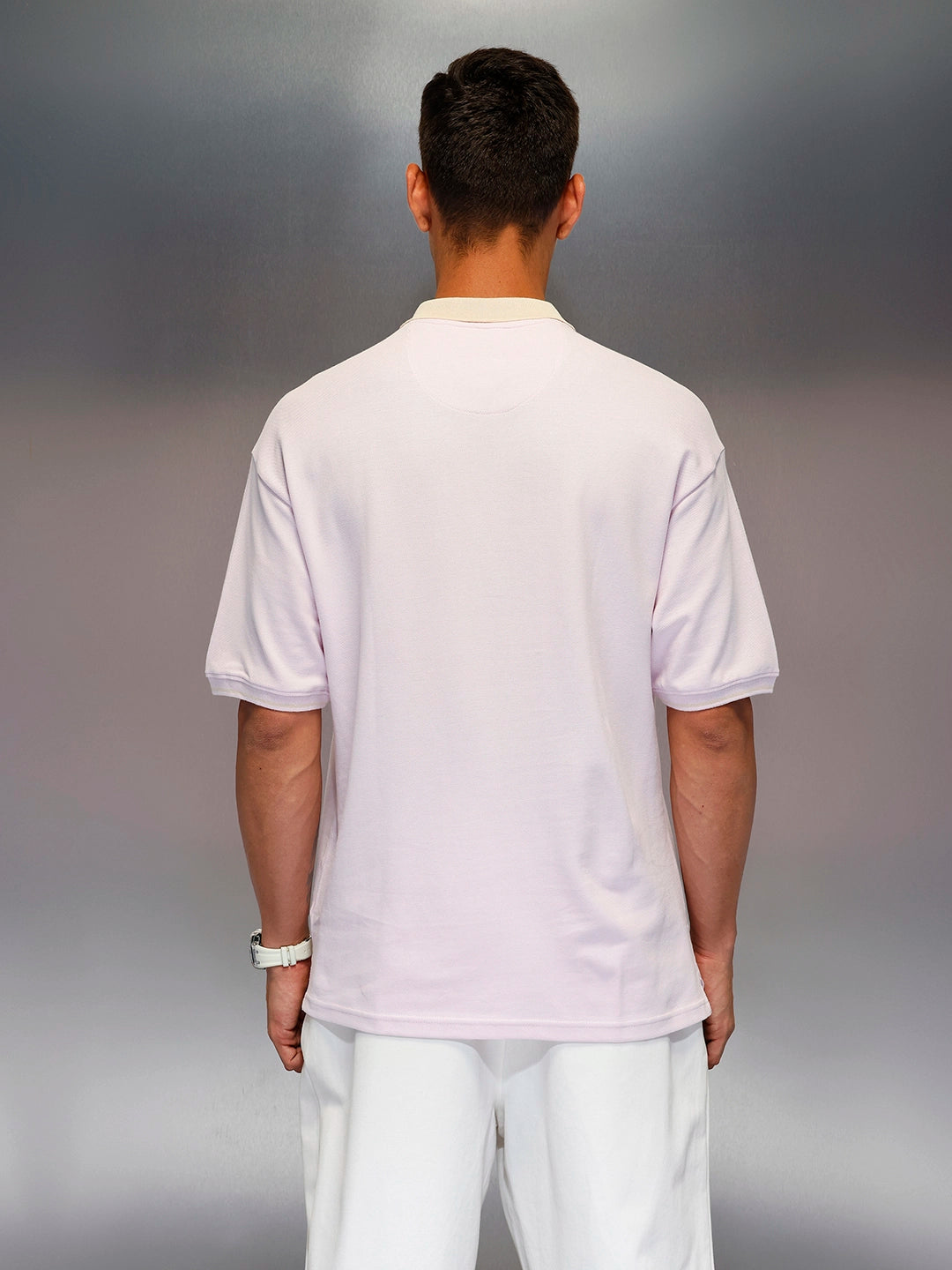 Men's oversize polo tshirt with contrast collar & graphic chest print | Pink