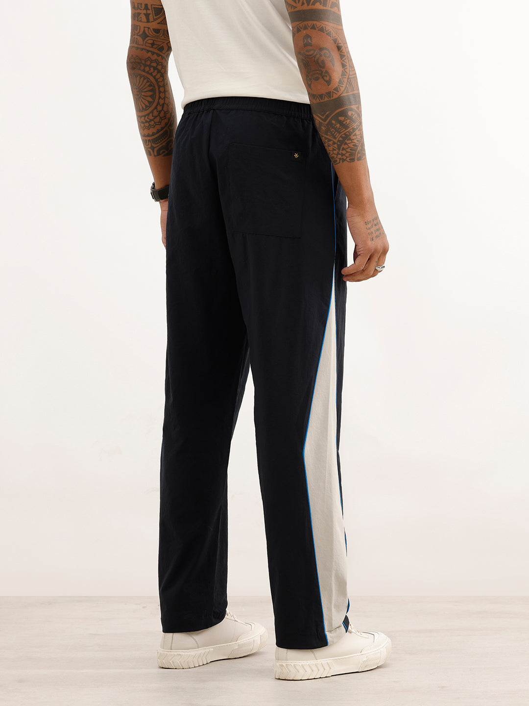 Classic Side Stripe Loose Fit Track Pant | Navy Blue