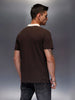 Men's slim-fit polo tee with contrast collar & graphic chest print | Brown