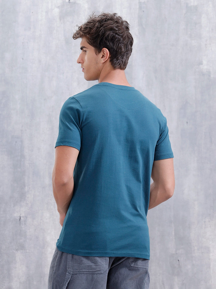 Ancient Markings Inspired Slim Fit Patchwork Brand Carrier T-Shirt | Teal