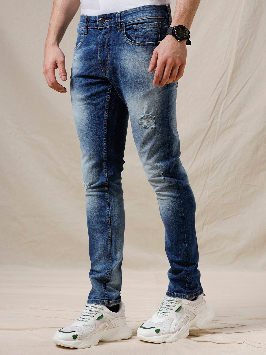 Ripped And Faded Casual Blue Jeans