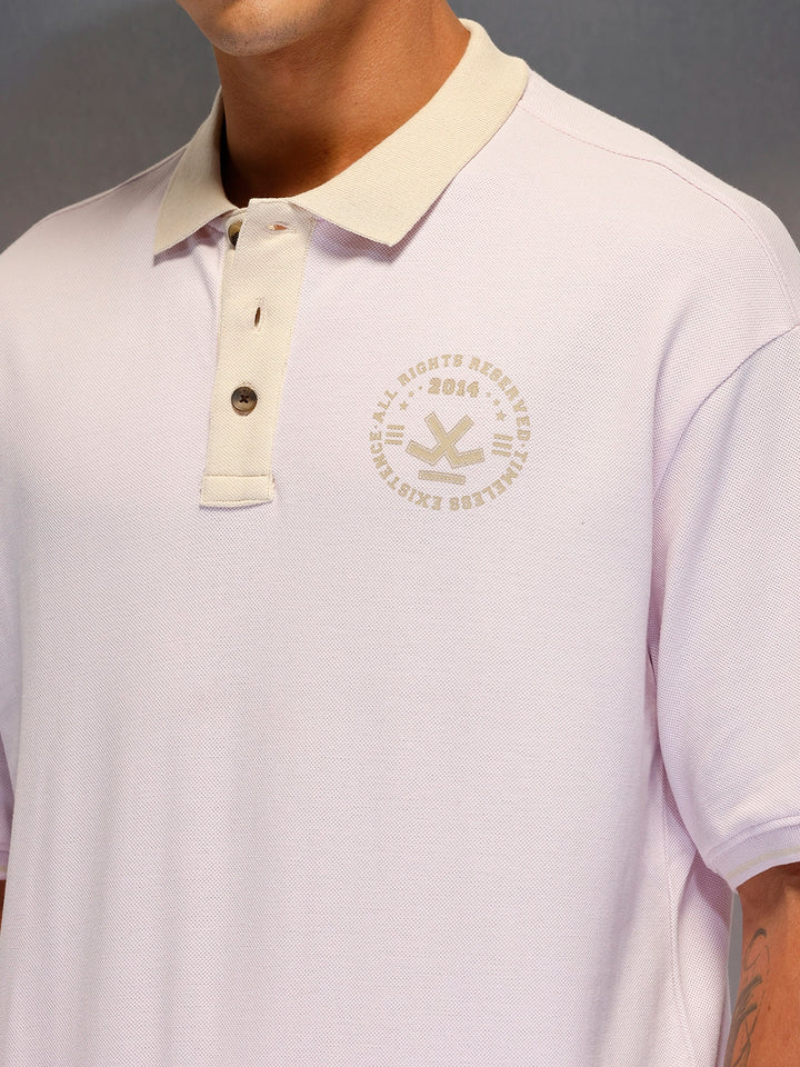 Men's oversize polo tshirt with contrast collar & graphic chest print | Pink