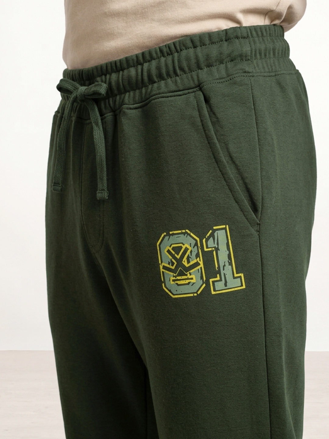 Solid Regular Fit Printed Jogger | Olive
