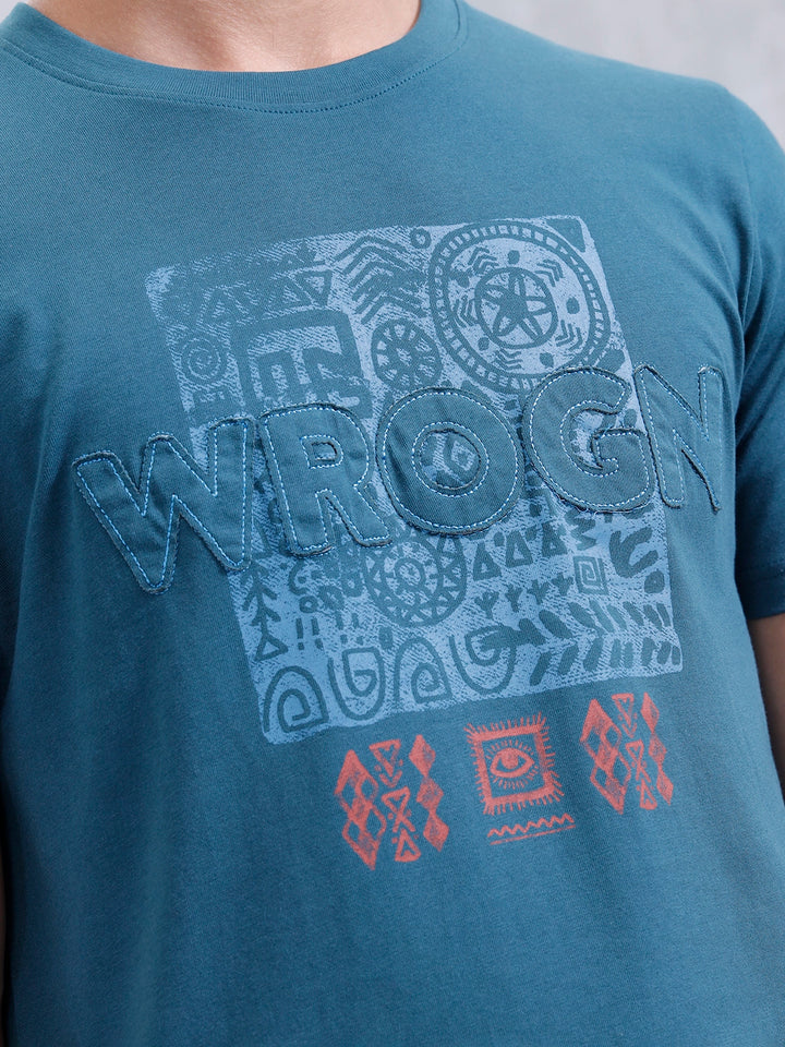 Ancient Markings Inspired Slim Fit Patchwork Brand Carrier T-Shirt | Teal