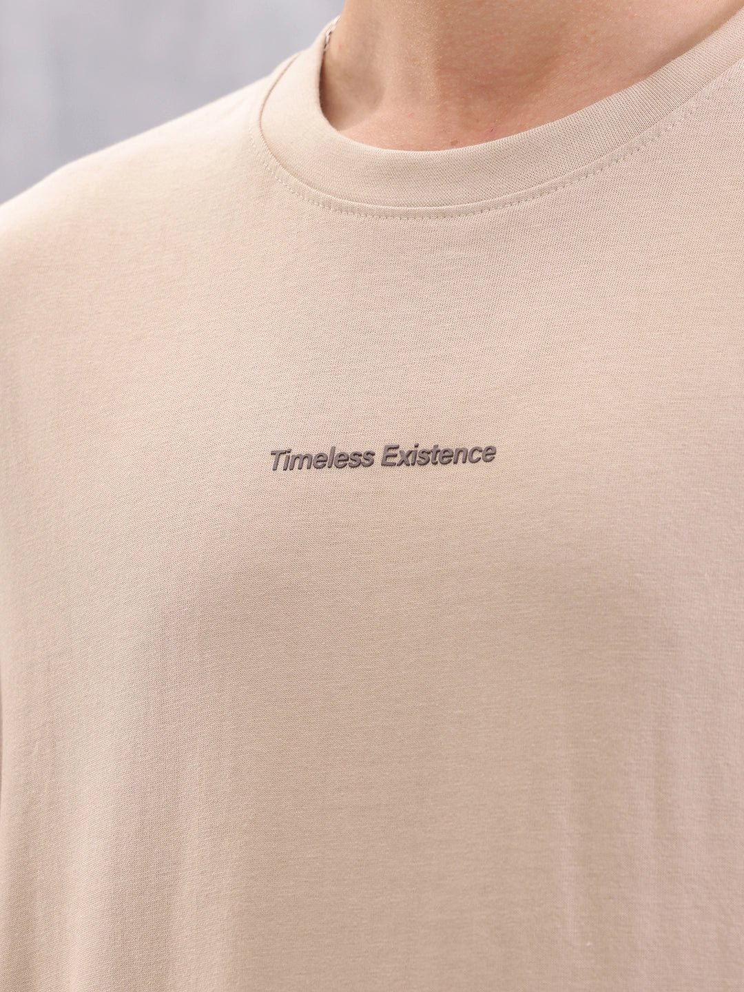 Casual Comfort Fit T-shirt With Typo Print And High Low Bottom Hem | Beige