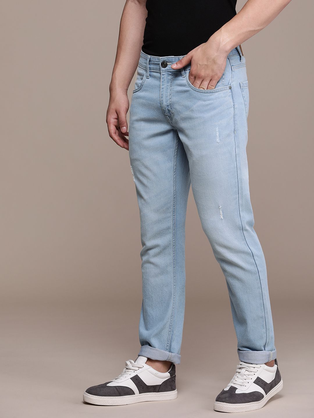 Mildly Distressed Light Fade Mid-Rise Jeans