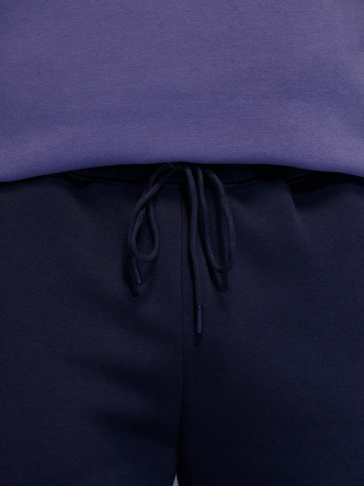 Men's casual slim fit jogger with placement graphic print | Navy Blue