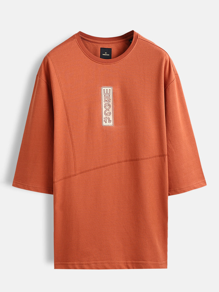 Men’s oversized 3/4 sleeve T-shirt with chest print & tonal stich detail | Rust