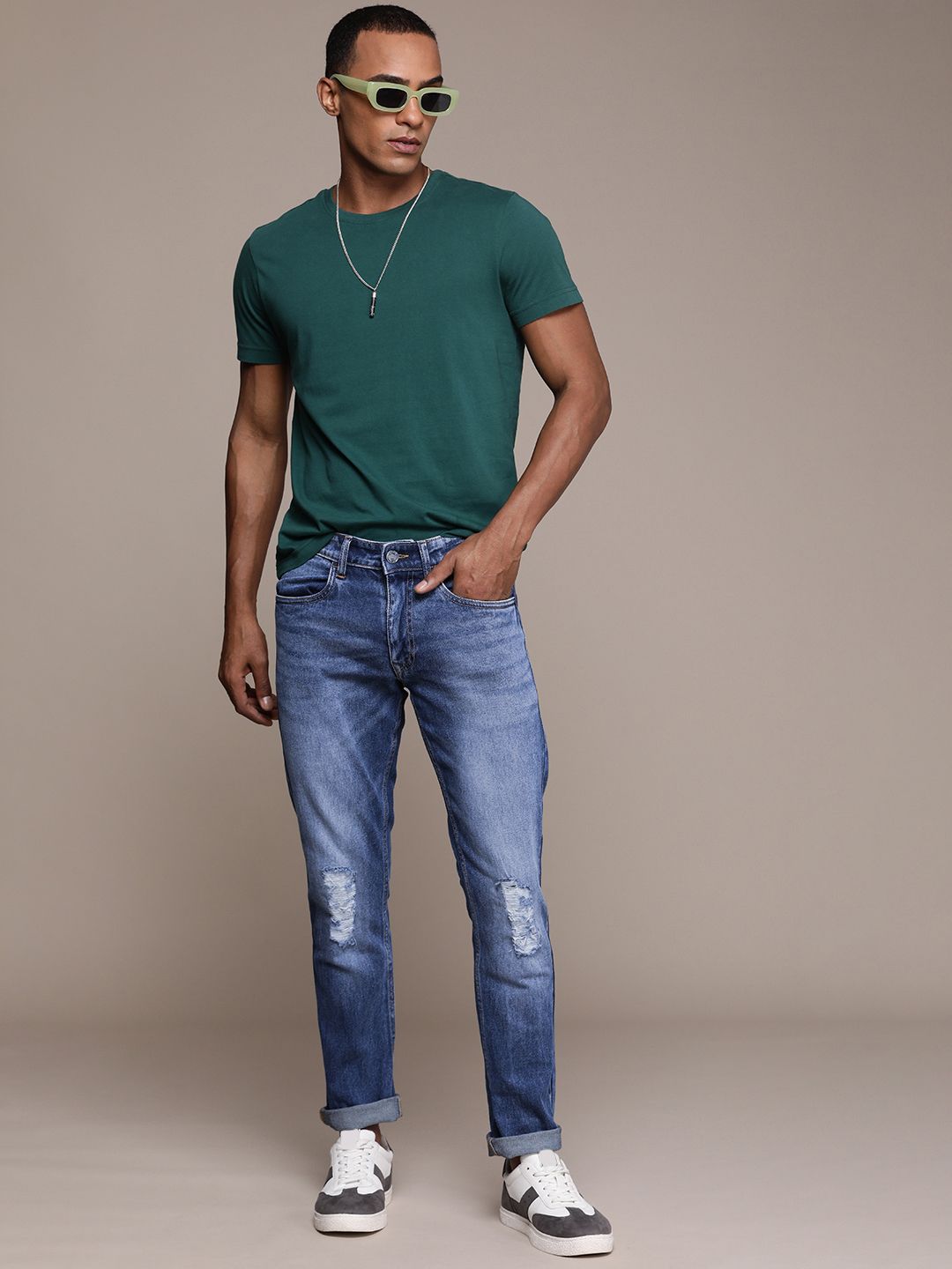 Mildly Distressed Slim Fit Mid-Rise Jeans