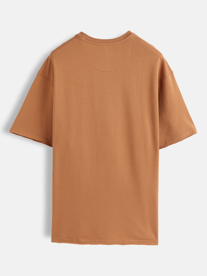 Solid Oversized T-Shirt With Printed Canvas Patch And Raw Edge Detail | Brown