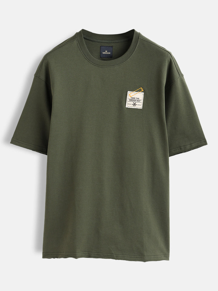 Solid Oversized T-Shirt With Printed Canvas Patch And Raw Edge Detail | Olive