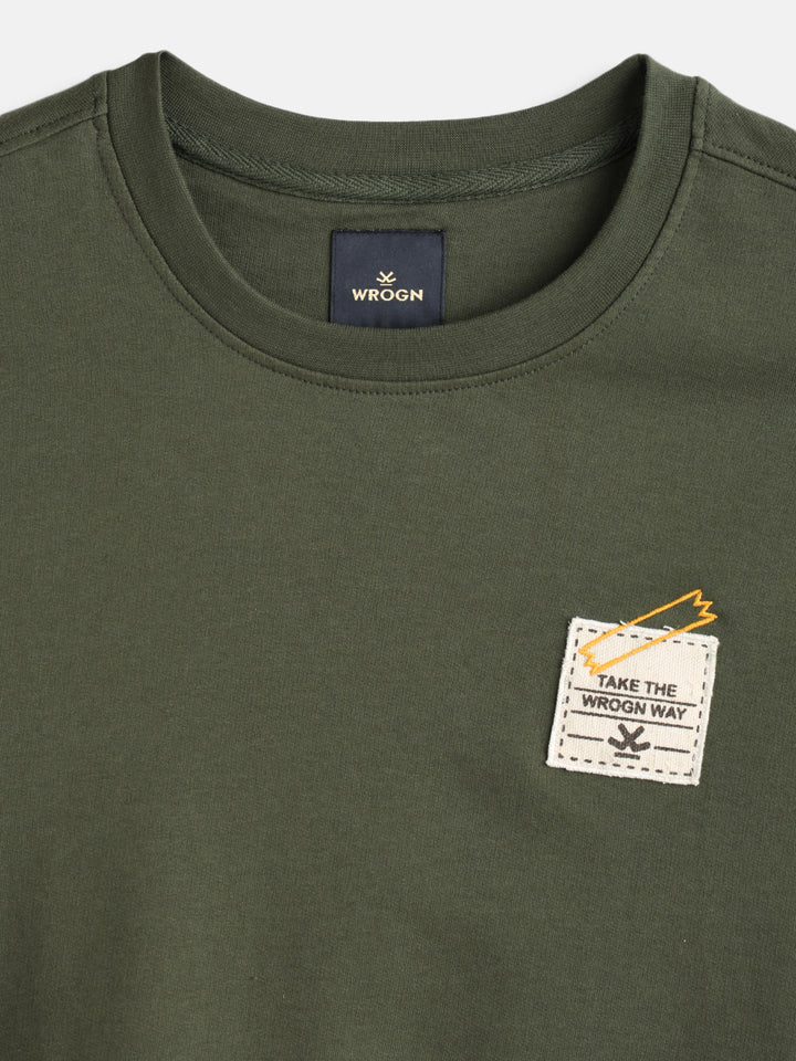 Solid Oversized T-Shirt With Printed Canvas Patch And Raw Edge Detail | Olive