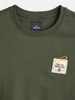 Solid Oversized T-Shirt With Printed Canvas Patch And Raw Edge Detail | Olive