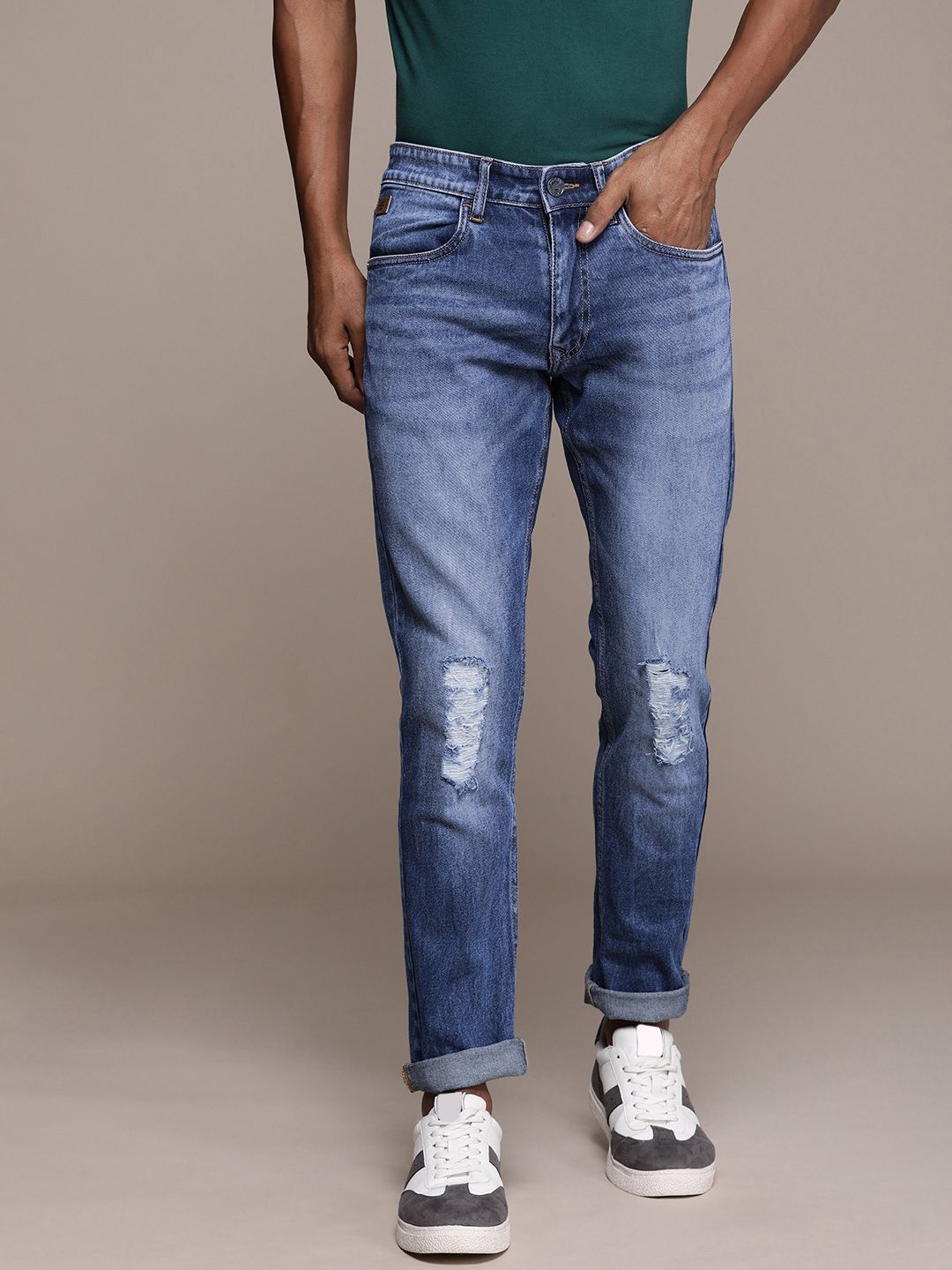 Mildly Distressed Slim Fit Mid-Rise Jeans