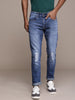 Mildly Distressed Slim Fit Mid-Rise Jeans