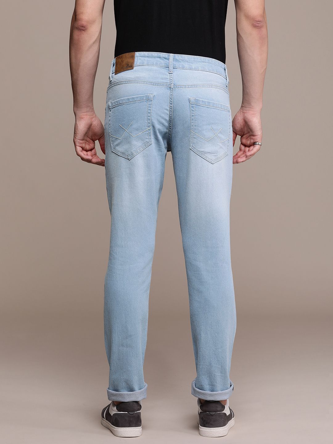 Mildly Distressed Light Fade Mid-Rise Jeans