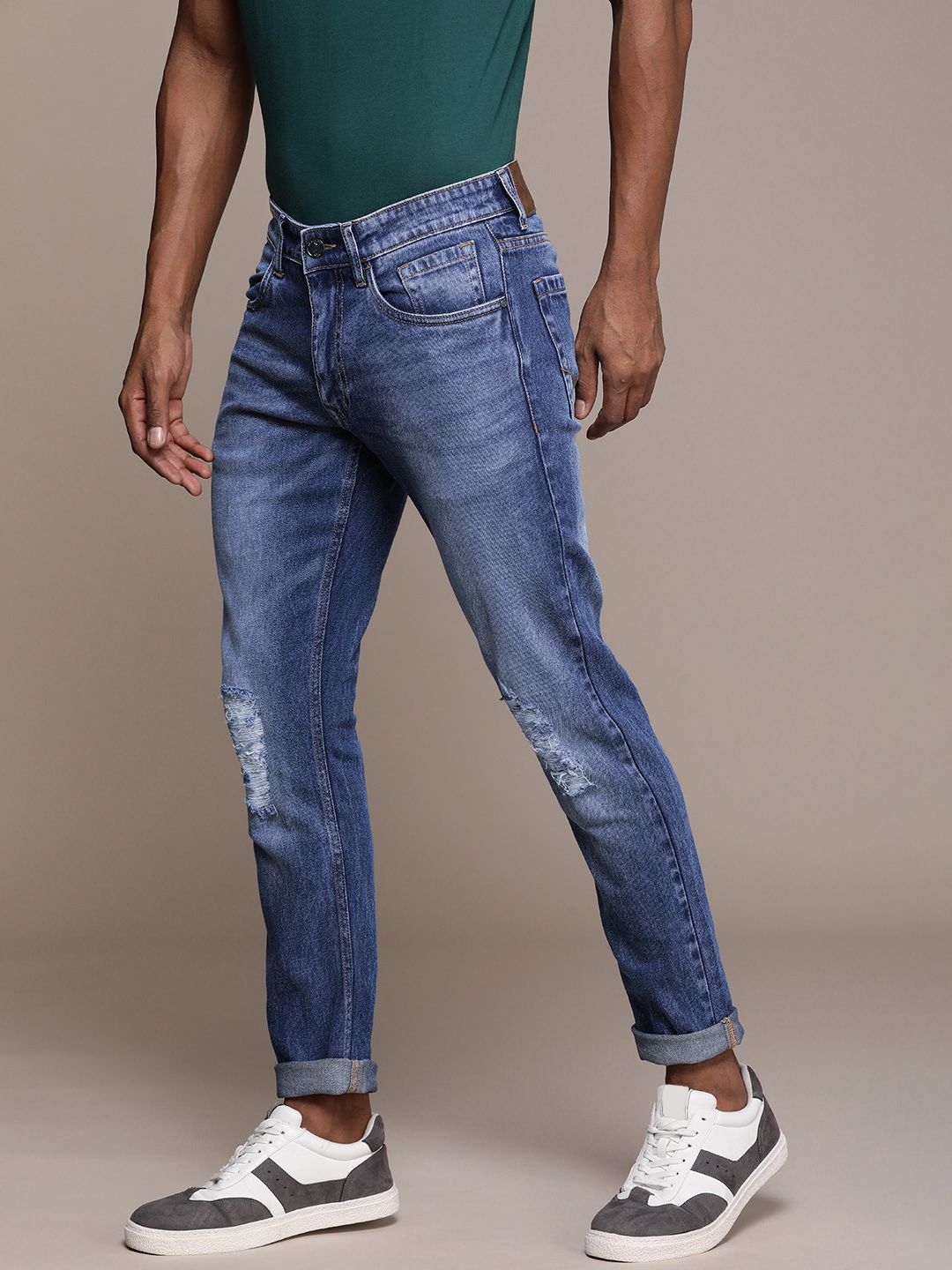 Mildly Distressed Slim Fit Mid-Rise Jeans